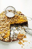 Streusel cake with mango, partly served