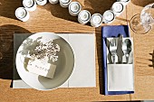 Laid table with cutlery pocket and name tag