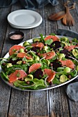 Beetroot salad with avocado, spinach and pink grapefruit