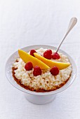 Rice pudding with raspberries and mango