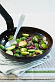 Pan-fried Brussels sprouts with red onions and cranberries