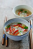 Cellophane noodle soup with ginger, chilli, garlic, peppers and coriander
