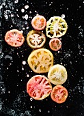 Tomatoes, cut in half, in water