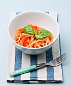 Spaghetti with tomato sauce and basil