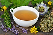 Herbal tea with ingredients (lemon balm, passion flower, St. John's wort, hops, lavender and orange flowers)