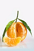 A half-peeled mandarin