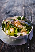 Prawn salad with melons and spring onions