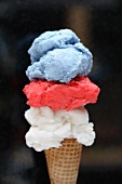 Red, white and blue ice cream in cone