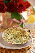 Crab gratin served in a shell with a herb crust