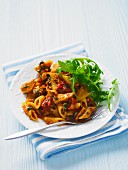 Penne with Chicken and Sundried Tomatoes in a White Bowl