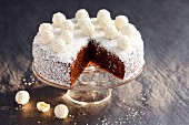 Chocolate cake with grated coconut and coconut truffles