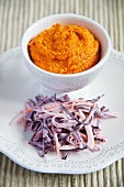 Red pepper and potato mash with purple coleslaw
