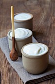 Three pots of homemade yoghurt