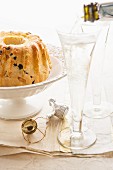 A Bundt cake and champagne glasses