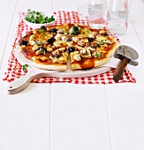 Chicken, olive and mushroom pizza