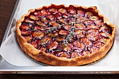 A plum tart with lavender