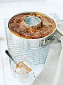A Bundt cake with cinnamon sugar in a baking tin