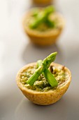 A mushroom tartlet with green asparagus