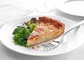 cheese and chive quiche with a rocket salad