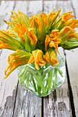 Courgette flowers in a vase