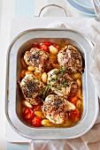 Braised spring chickens with beans and tomatoes