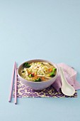 Noodle soup with chicken, sweetcorn, broccoli, carrots and pepper