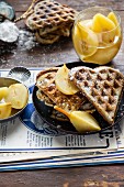 Heart-shaped waffles with poppy seeds and pears