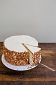 Layered Coconut Cake with a Slice Removed