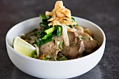 Asian noodle soup with pork