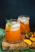 Peach and rosemary cocktail