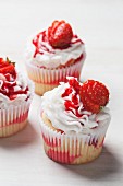Three marble strawberry cupcakes