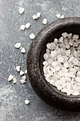 Sea salt crystals in a mortar