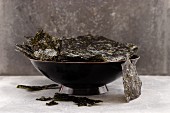A bowl of seaweed chips