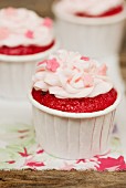 Red Velvet cupcakes decorated with sugar flowers
