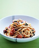 Spaghetti puttanesca with tomatoes and olives