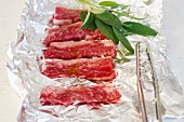 Wagyu with sage on aluminium foil