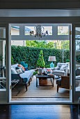 Seating & coffee table on festively decorated terrace