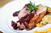 Duck breast with cranberry sauce and rosemary