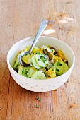 Potato salad with gherkins and cucumber