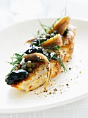 Chicken breast with olives, capers and anchovies