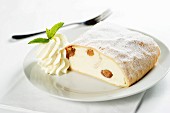 Apple quark strudel with whipped cream