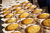 Gratinated mashed potatoes in silver dishes