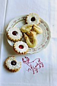 Jam shortbreads and Vanillekipferl (cresent-shaped vanilla biscuits) on a plate