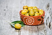 A bowl of green olives