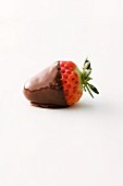 A strawberry dipped in dark chocolate