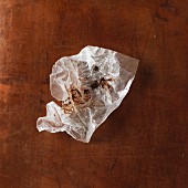 Remains of chocolate in a screwed up piece of paper