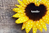 Sonnenblume mit Punkten & der Aufschrift Smile