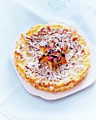 A tart decorated with chopped sweets
