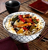 Rice noodles with chicken, vegetables and black bean sauce (Asia)