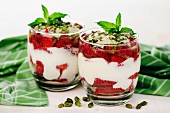 Greek yogurt with strawberries and pistachio nuts